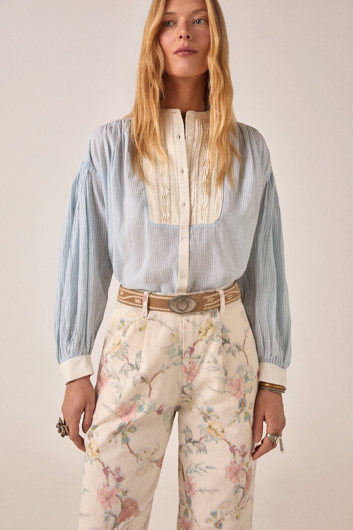 ELSHAM BOUTIQUE Bonifacio shirt in light blue pinstripe cotton with cream embroidered yoke and balloon sleeves.