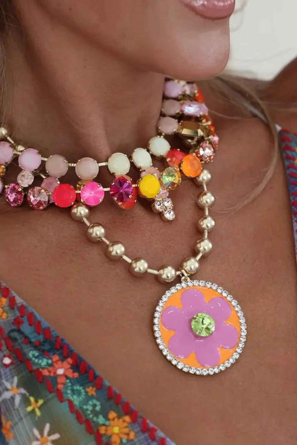 ELSHAM BOUTIQUE Toshka necklace in Citrus Lime Champagne with enamel flower pendant, crystals, and antique gold brass.