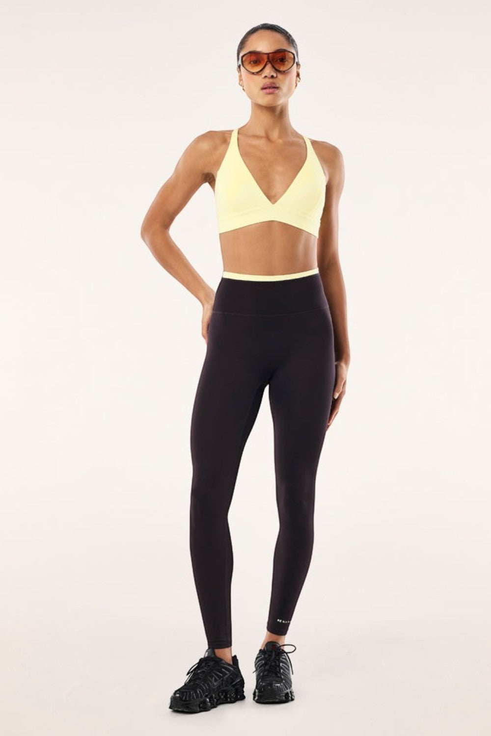 ELSHAM BOUTIQUE Vita full length leggings in black bean with a soft yellow high-rise waistband and logo detail