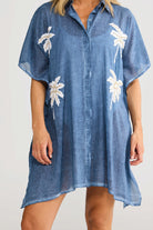 ELSHAM BOUTIQUE navy cotton shirt kaftan with white palm tree embroidery and concealed button front closure
