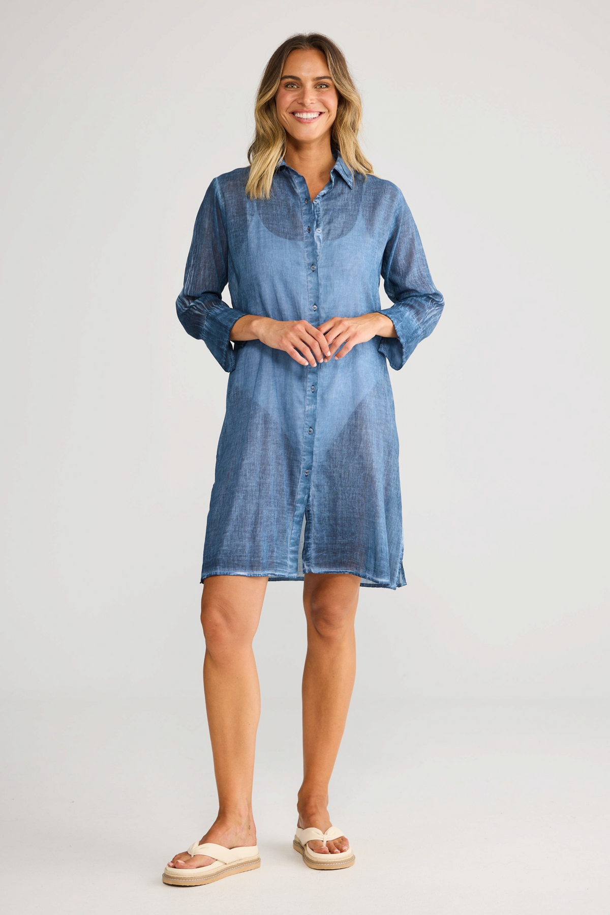 ELSHAM BOUTIQUE navy blue cotton shirt dress with short sleeves and button front, worn by a smiling model