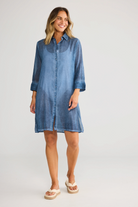 ELSHAM BOUTIQUE Lilo navy cotton shirt dress with short sleeves and concealed button front on a smiling model