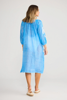 ELSHAM BOUTIQUE blue cotton knee-length dress with three-quarter sleeves and white embroidery, back view