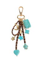 ELSHAM BOUTIQUE Wild West keyring featuring turquoise-look charms, wooden beads, and gold-tone metal accents.