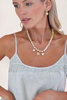ELSHAM BOUTIQUE Glitterbelle necklace in peachfuzz with crystals and beads on antique gold plated brass